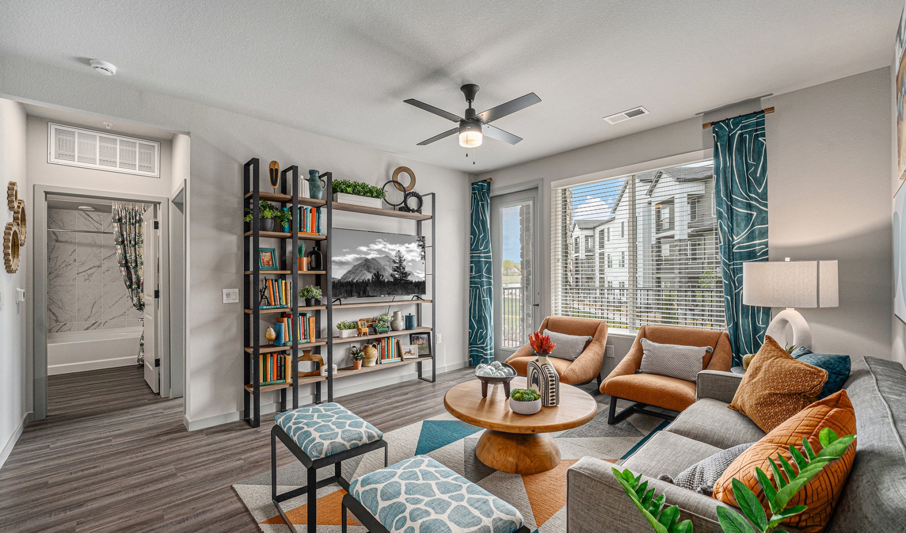 Gorgeous living room with vinyl plank flooring  Living room with chairs and couches on vinyl plank flooring