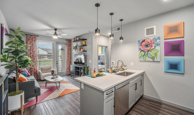 Kitchen and living room Kitchen view and living room with stainless steel appliances